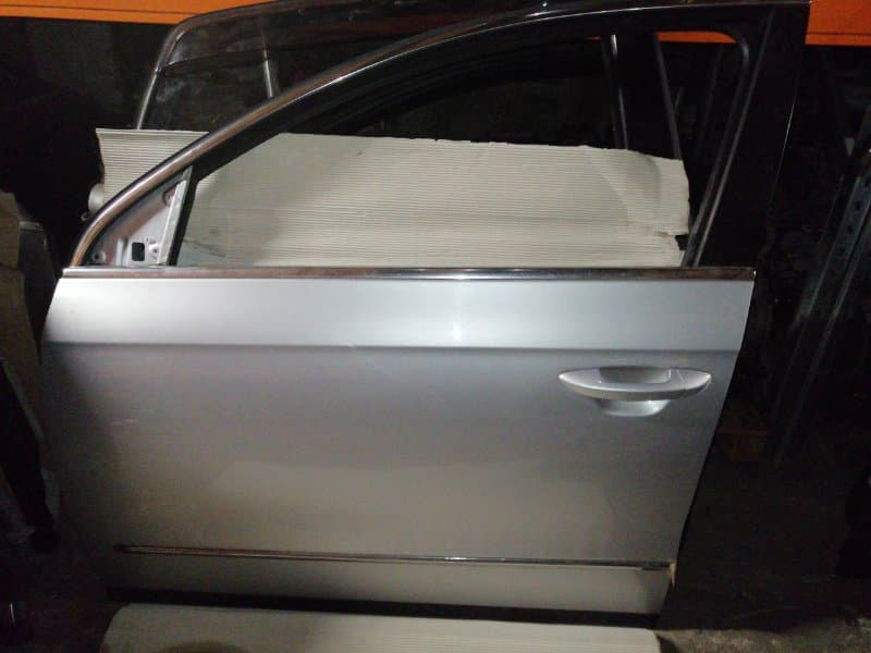 Дверь Volkswagen Passat 3C перед. лев. (б/у)