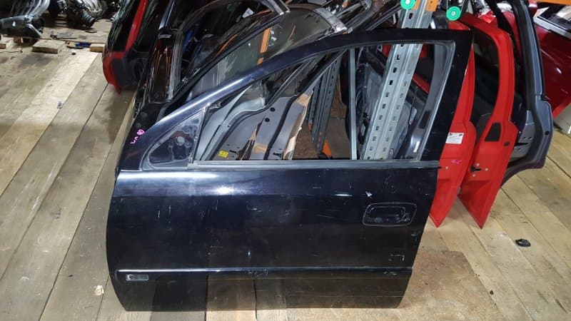 Дверь Opel Astra G 2002 перед. лев. (б/у)