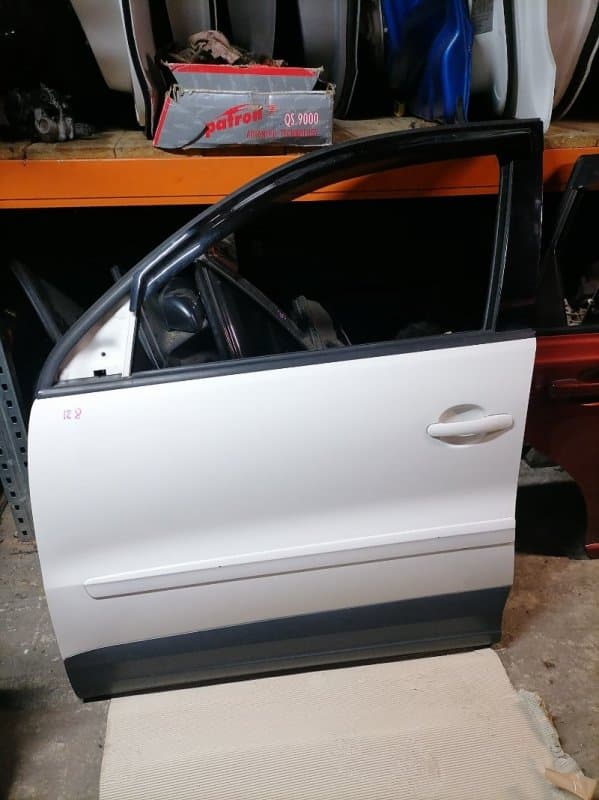 Дверь Volkswagen Tiguan 5N1 CAW 2010 перед. лев. (б/у)