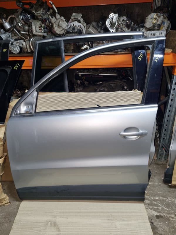 Дверь Volkswagen Tiguan 5N1 CAW 2010 перед. лев. (б/у)