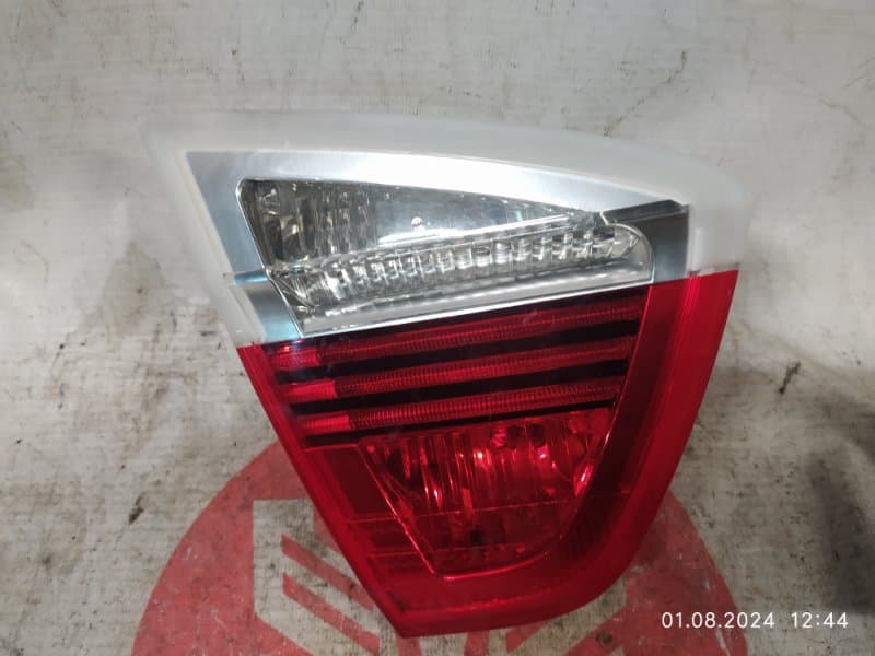 Фонарь крышки багажника BMW 3-серия E90 N46B20BY 2006 задн. лев. (б/у)