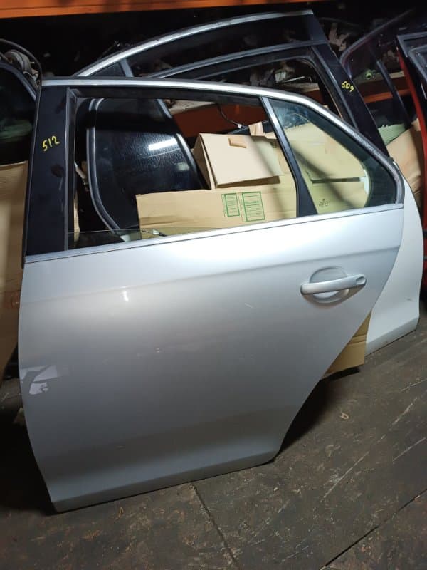 Дверь Volkswagen Jetta 1K2 BVY 2009 задн. лев. (б/у)