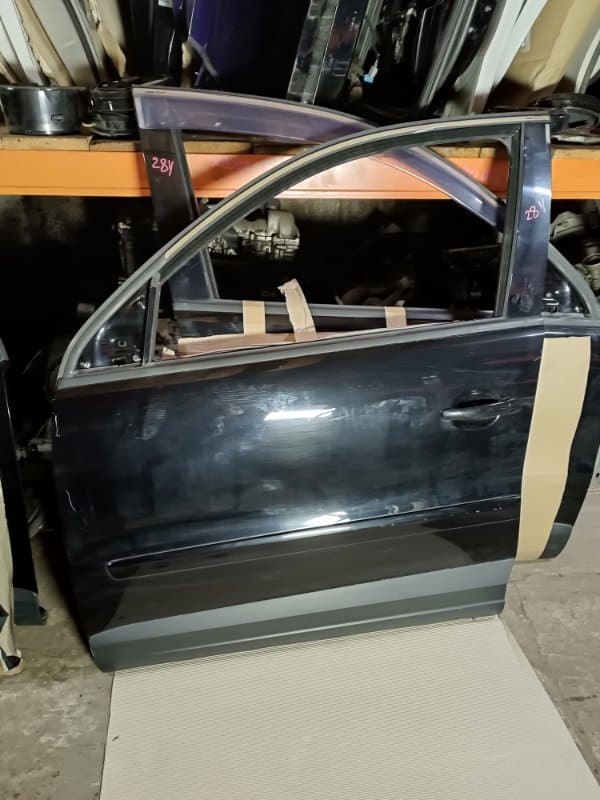 Дверь Volkswagen Tiguan 5N1 CAW 2009 перед. лев. (б/у)