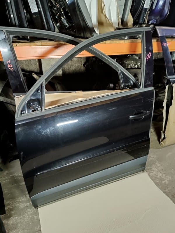 Дверь Volkswagen Tiguan 5N1 CAW 2010 перед. лев. (б/у)