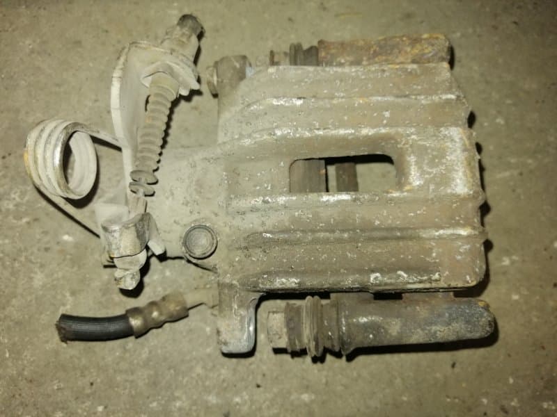 Суппорт Volkswagen Passat B5+ задн. лев. (б/у)