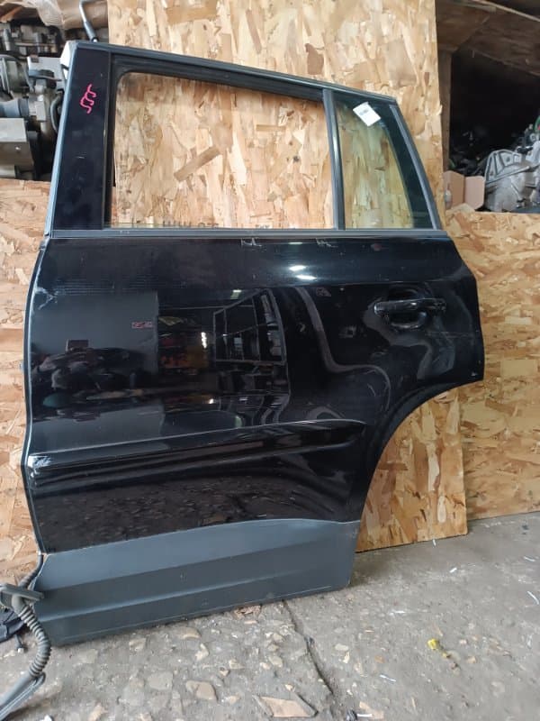 Дверь Volkswagen Tiguan 5N1 CAW 2009 задн. лев. (б/у)
